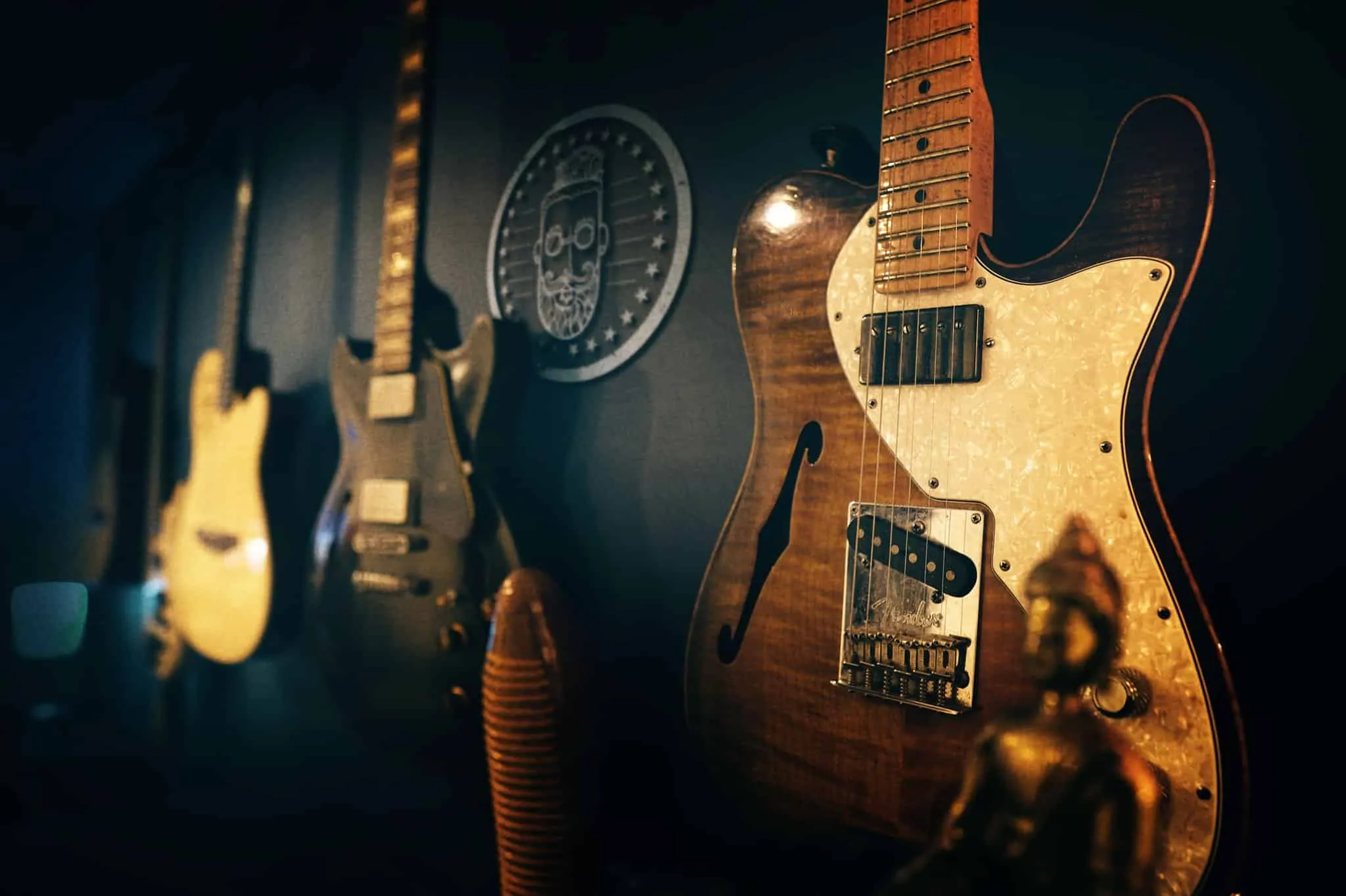 Ricky Castillo’s custom electric guitar among studio instruments