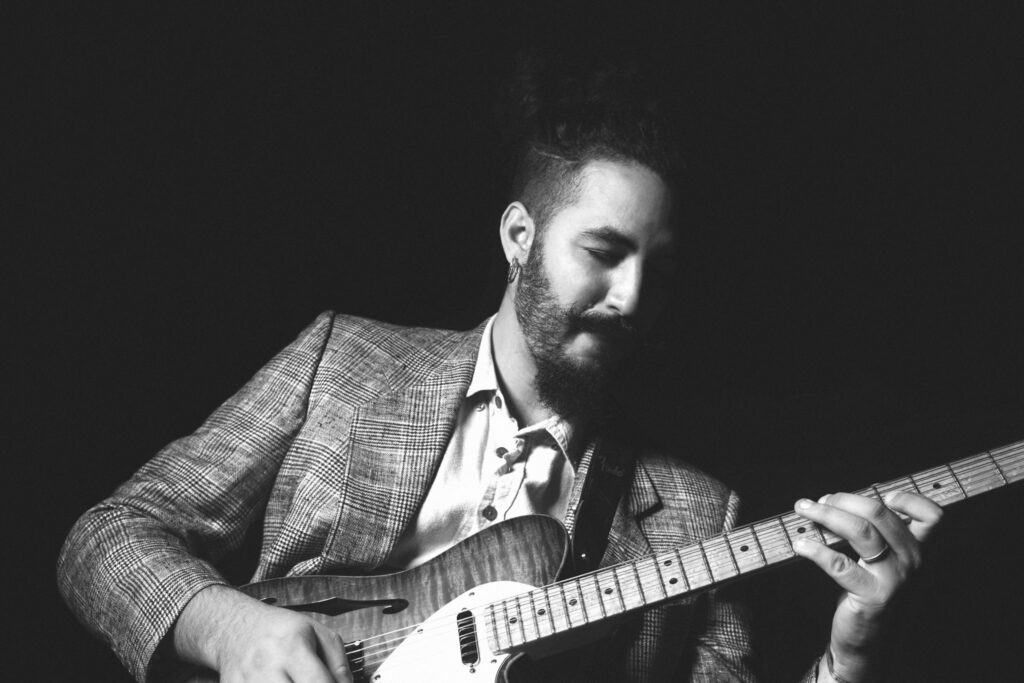 Ricky Castillo with guitar, Cuban-born jazz guitarist and composer